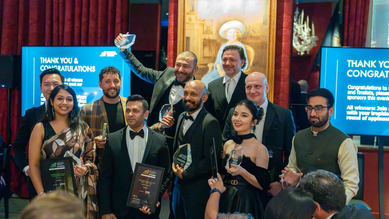 David Sikharulidze of Mavis Tech receiving the Best UK Market Entry Award with fellow winners at the Envestors Innovator Awards